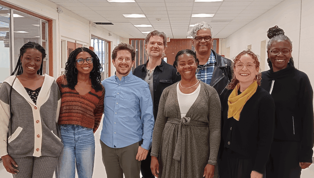 Group photo of eight people